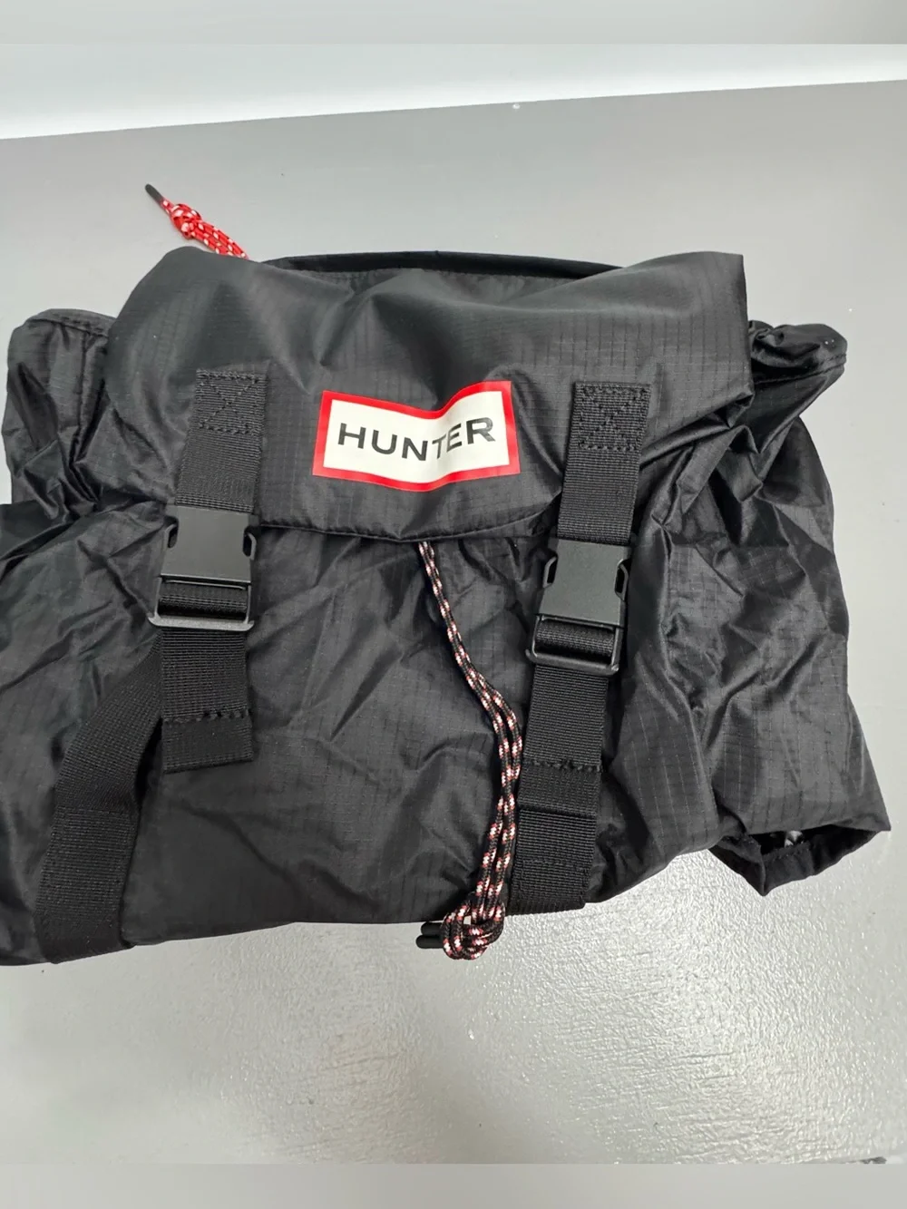 Hunter Black Backpack folds into Pouch